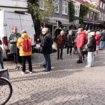 Groep deelnemers en ervaringsdeskundige op pad in Eindhoven.