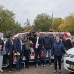 Groepsfoto samen met presentatrice, camera- en geluidsman van Omroep brabant, op de foto